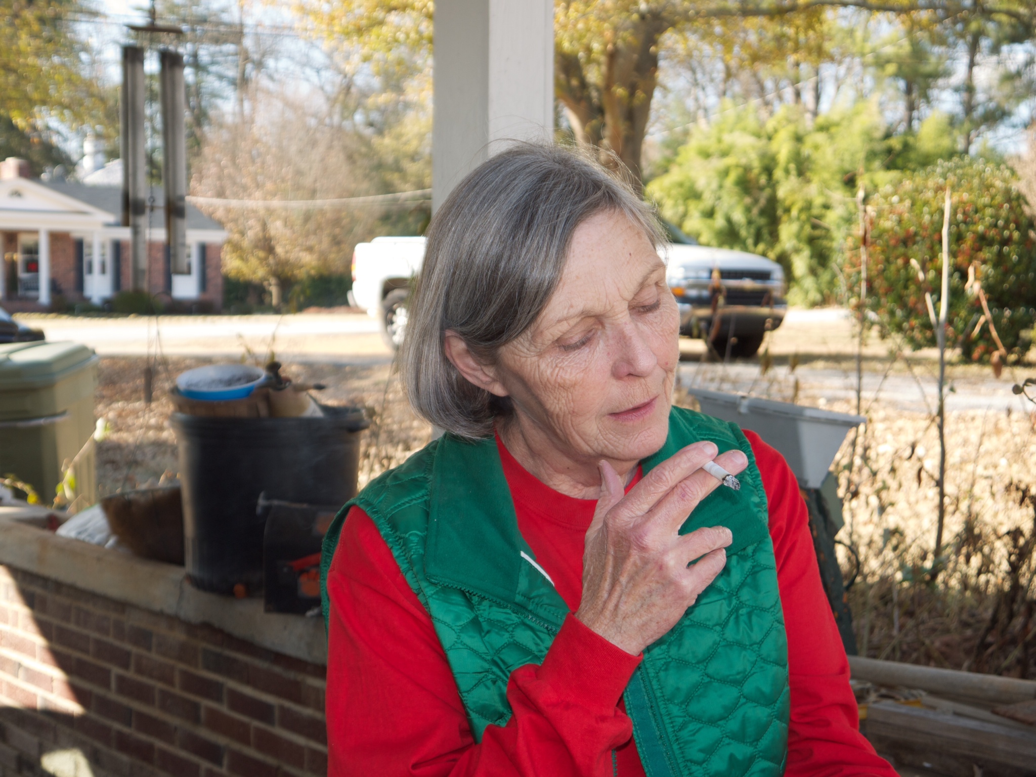 Susie smoking a cigarette